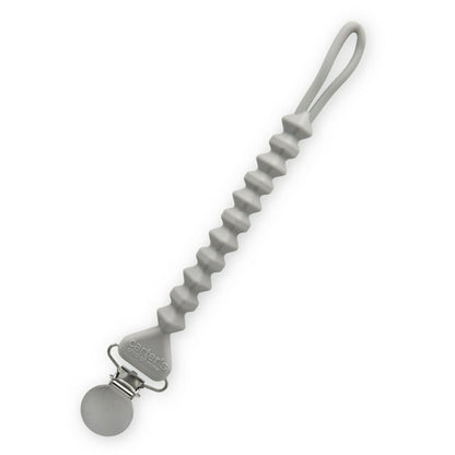 Gray pacifier clip with a textured handle on a white background