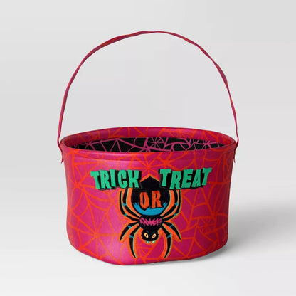 Halloween-themed candy bucket with spider design and 'Trick or Treat' text on a white background