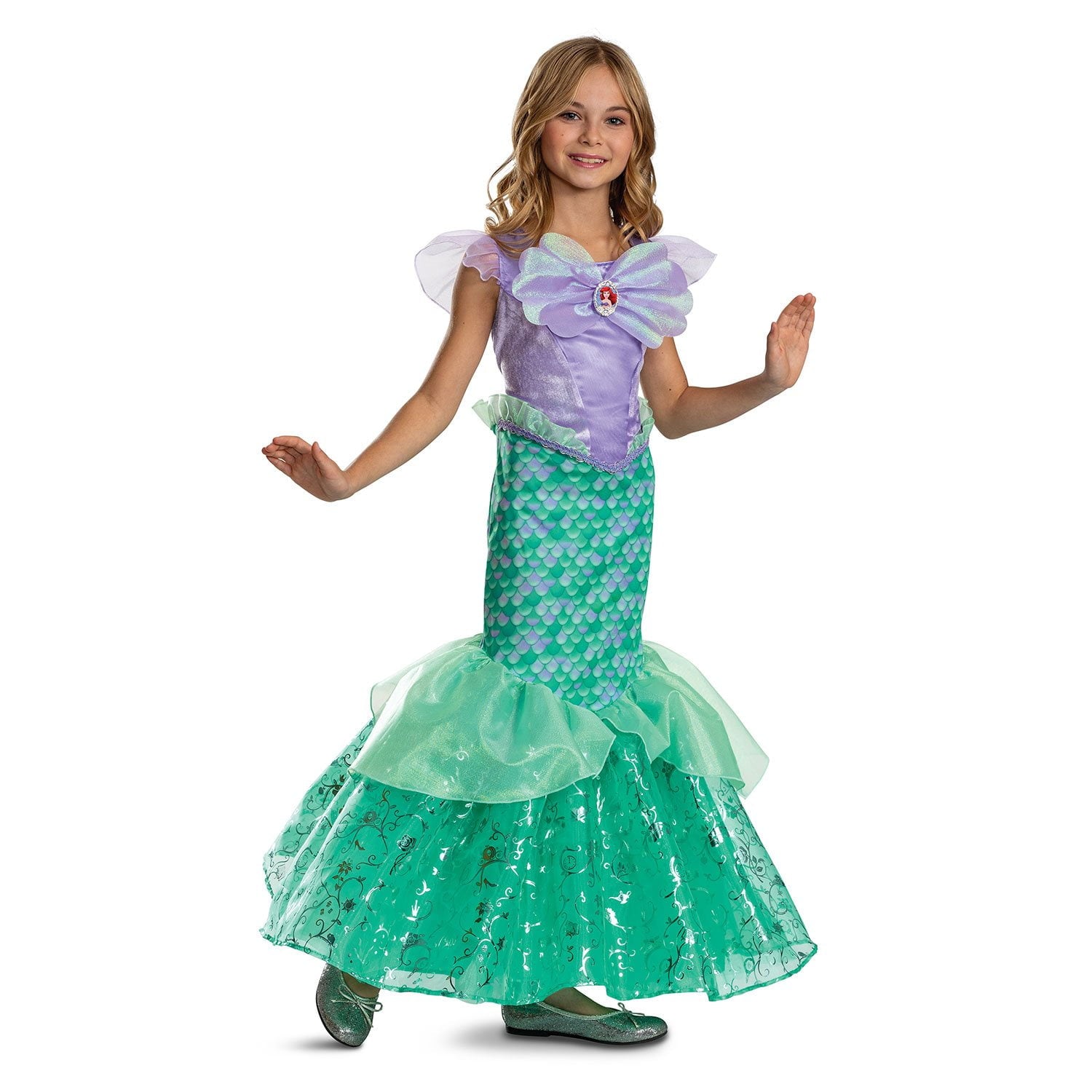 Halloween Child wearing a green and purple mermaid costume on a white background