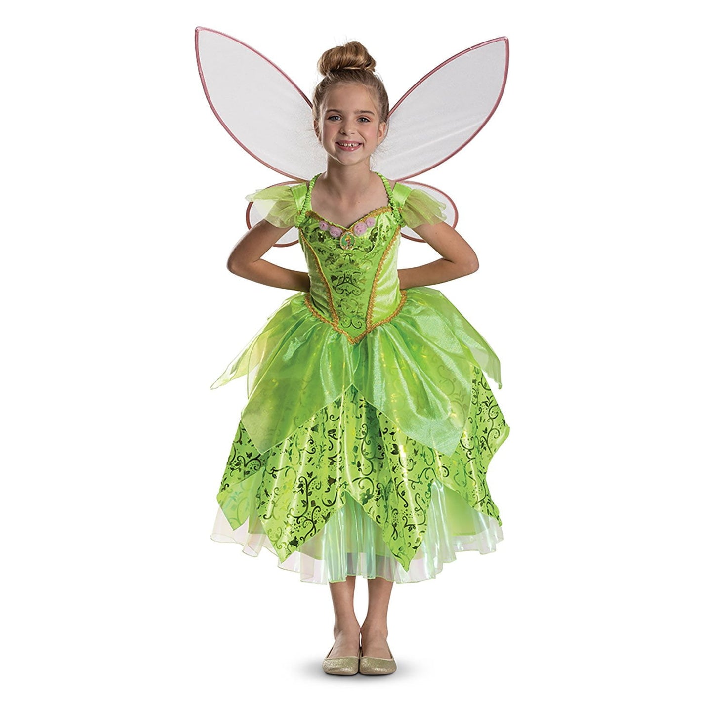 Halloween Child wearing a green fairy costume with wings on a white background