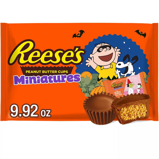 Halloween Themed Candy, Peanut Butter Cups Miniatures packaging with cartoon character and Halloween elements on an orange background.