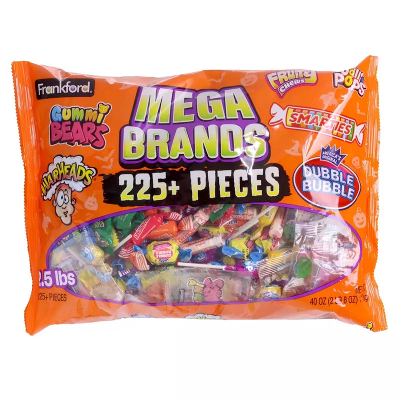 Halloween Themed Packaged candy mix with various brands on an orange background