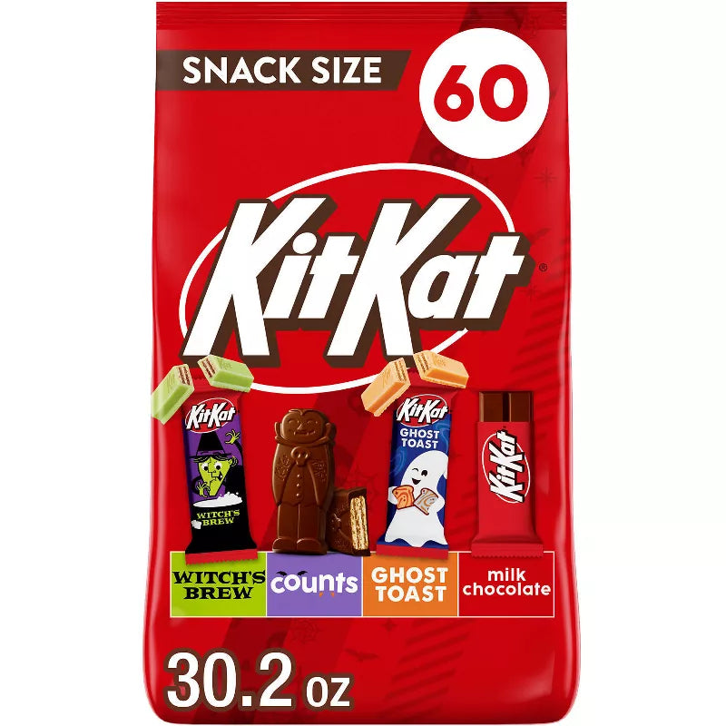 Halloween Themed candy, Chocolate candy bar snack size package with various flavors on a red background