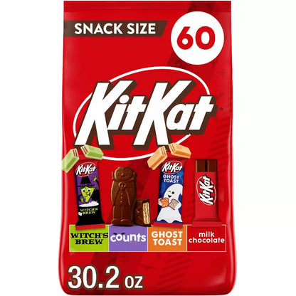 Halloween Themed candy, Chocolate candy bar snack size package with various flavors on a red background