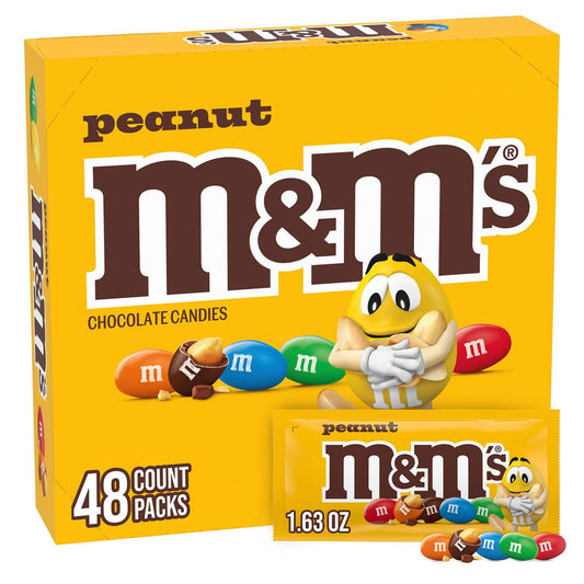 Halloween candy, Box of peanut chocolate candies with colorful characters on a yellow background.