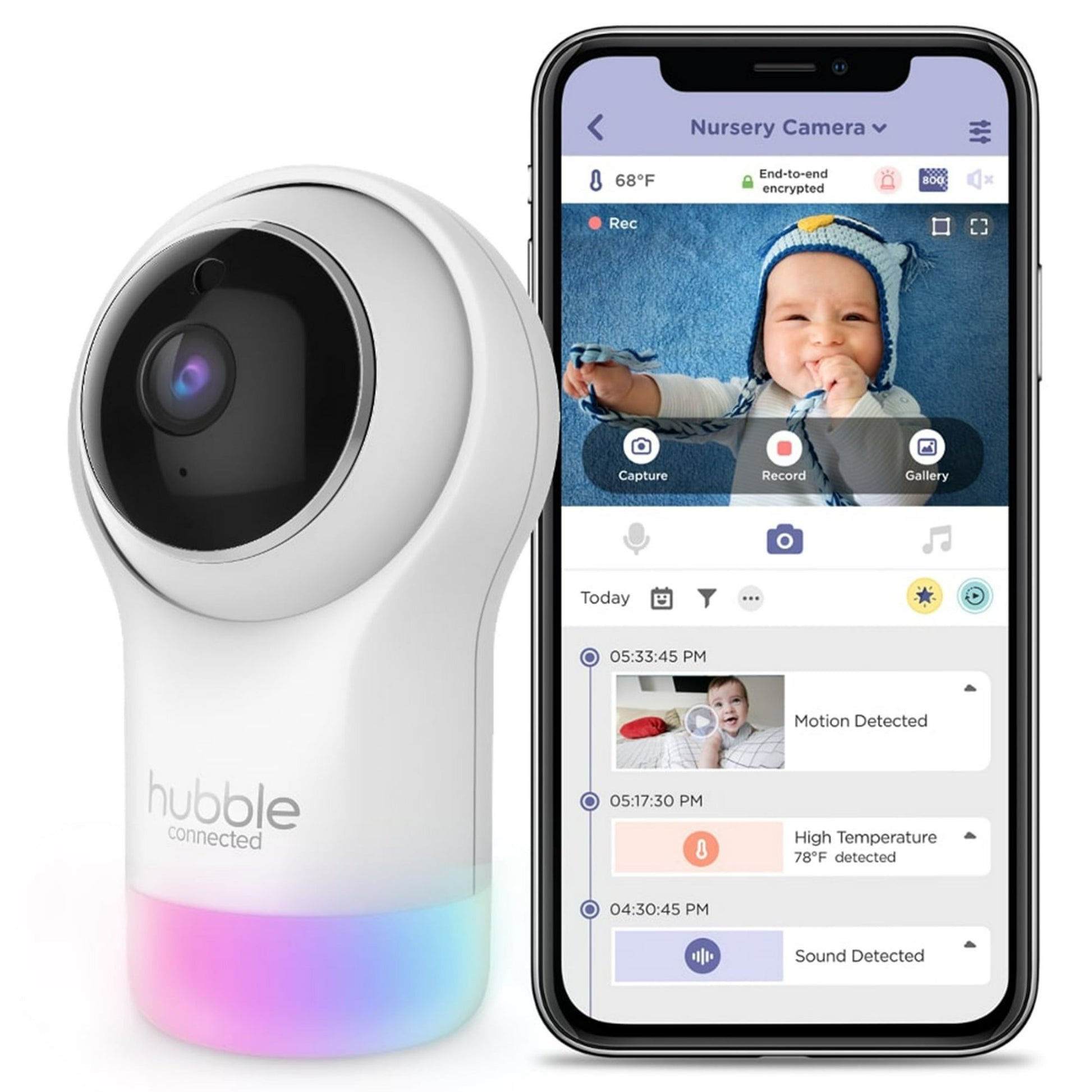 A baby monitor camera and a smartphone displaying the monitor's app interface with a baby's image