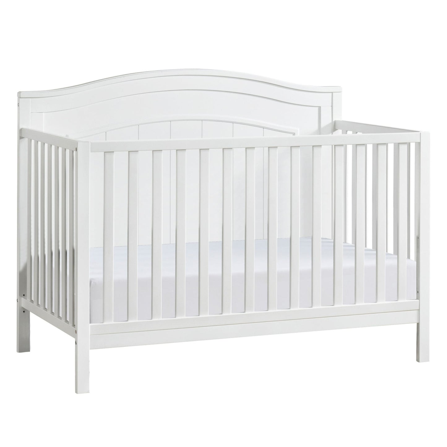 A white wooden baby crib with slatted sides and a curved headboard, containing a white mattress