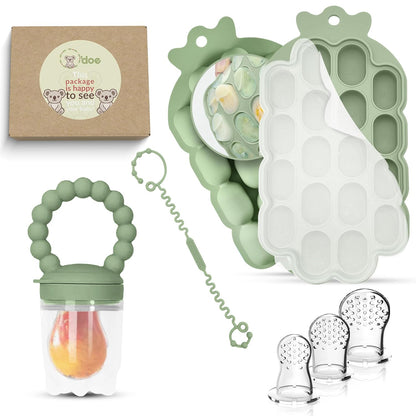 Set of green baby teething products including a teether, binky, and silicone molds on a white background.