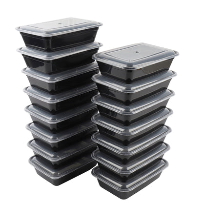 Stack of black food containers with clear lids on a white background