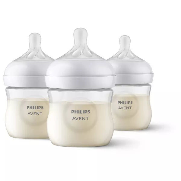 Three baby bottles on a white background