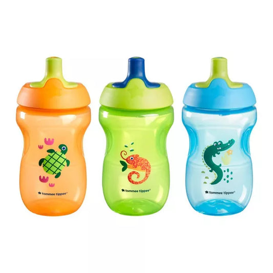 Three colorful sippy cups with animal designs on a white background