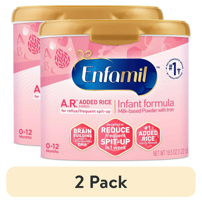 Two containers of Added Rice Infant Formula with pink and gold design.