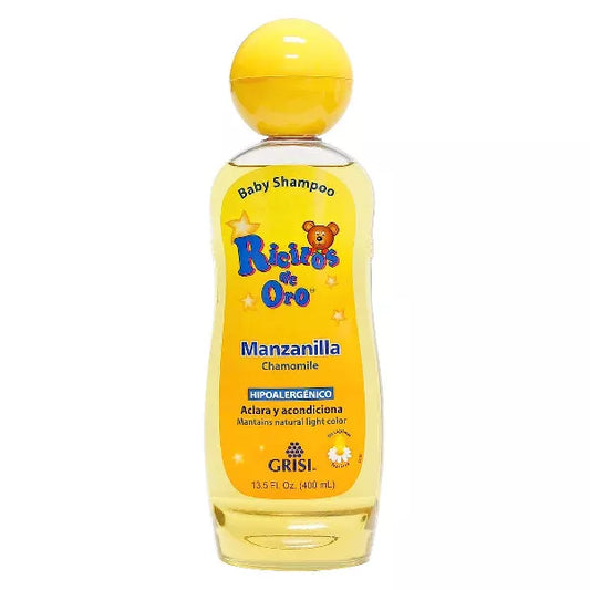 Yellow bottle of baby shampoo on a white background