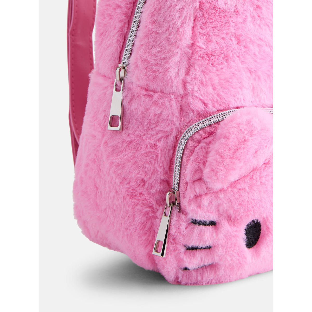 Cute mini backpack with soft fabric design and compact storage for everyday essentials