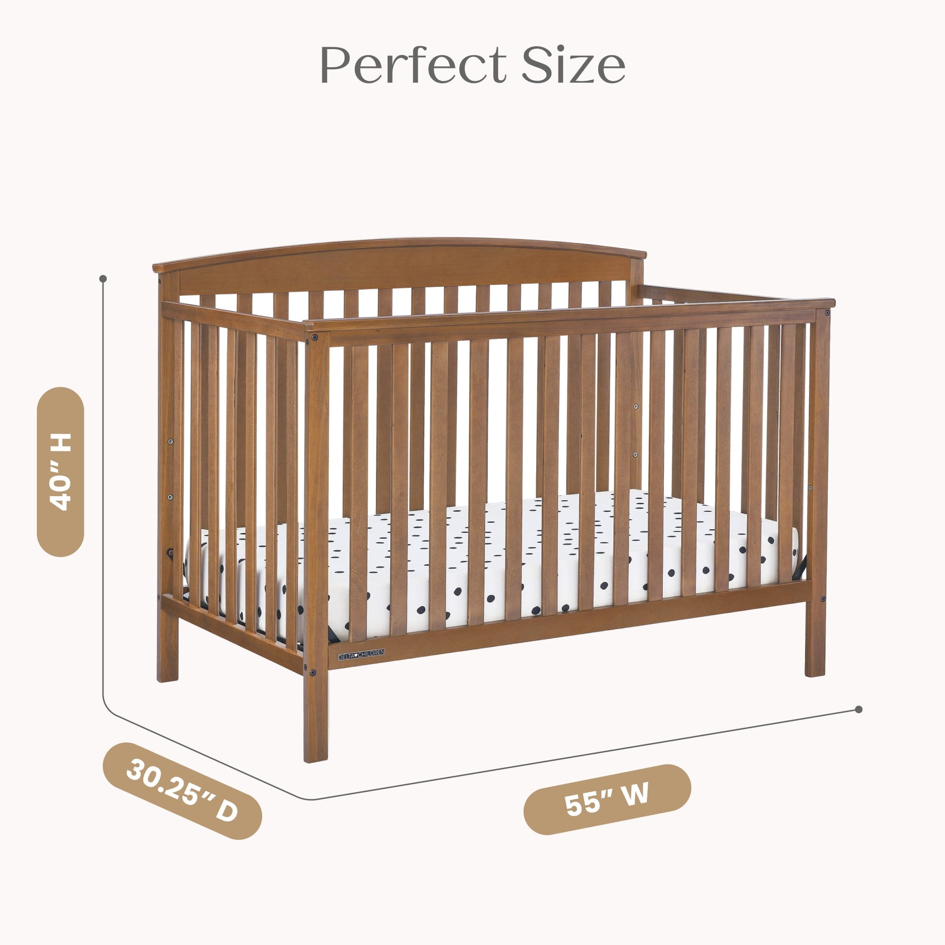 A wooden baby crib with a mattress and measurements for height, depth, and width