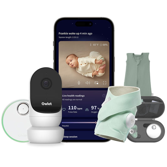 baby monitor system with smartphone app displaying baby's video feed and vital signs.
