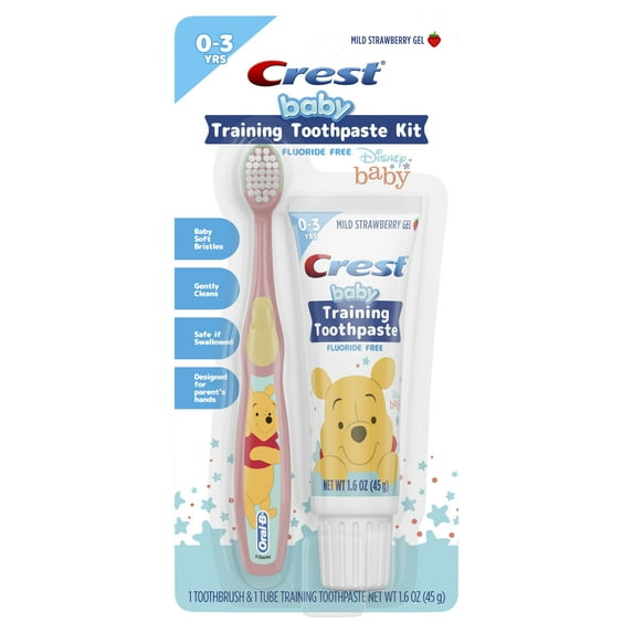 baby training toothpaste kit with toothbrush and toothpaste on a white background