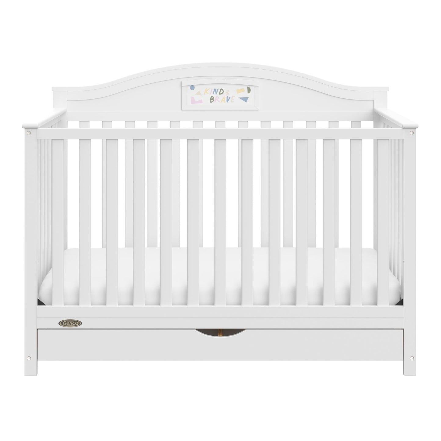 A white baby crib with vertical slats, a curved headboard, and a storage drawer underneath