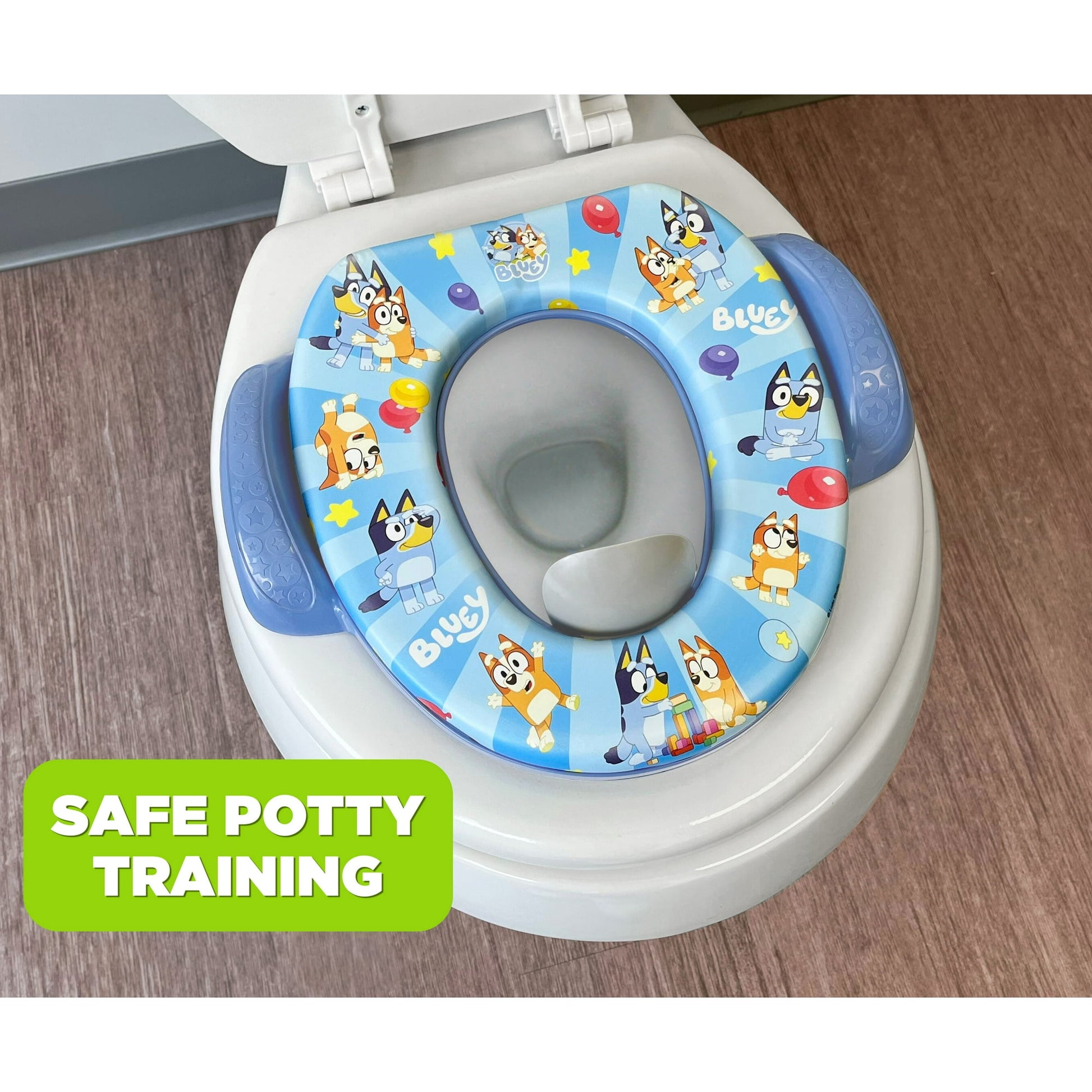 A blue color cushioned children's potty training seat featuring cartoon characters on a toilet