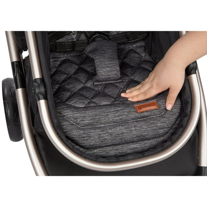 Image displaying a baby stroller with text about it's details