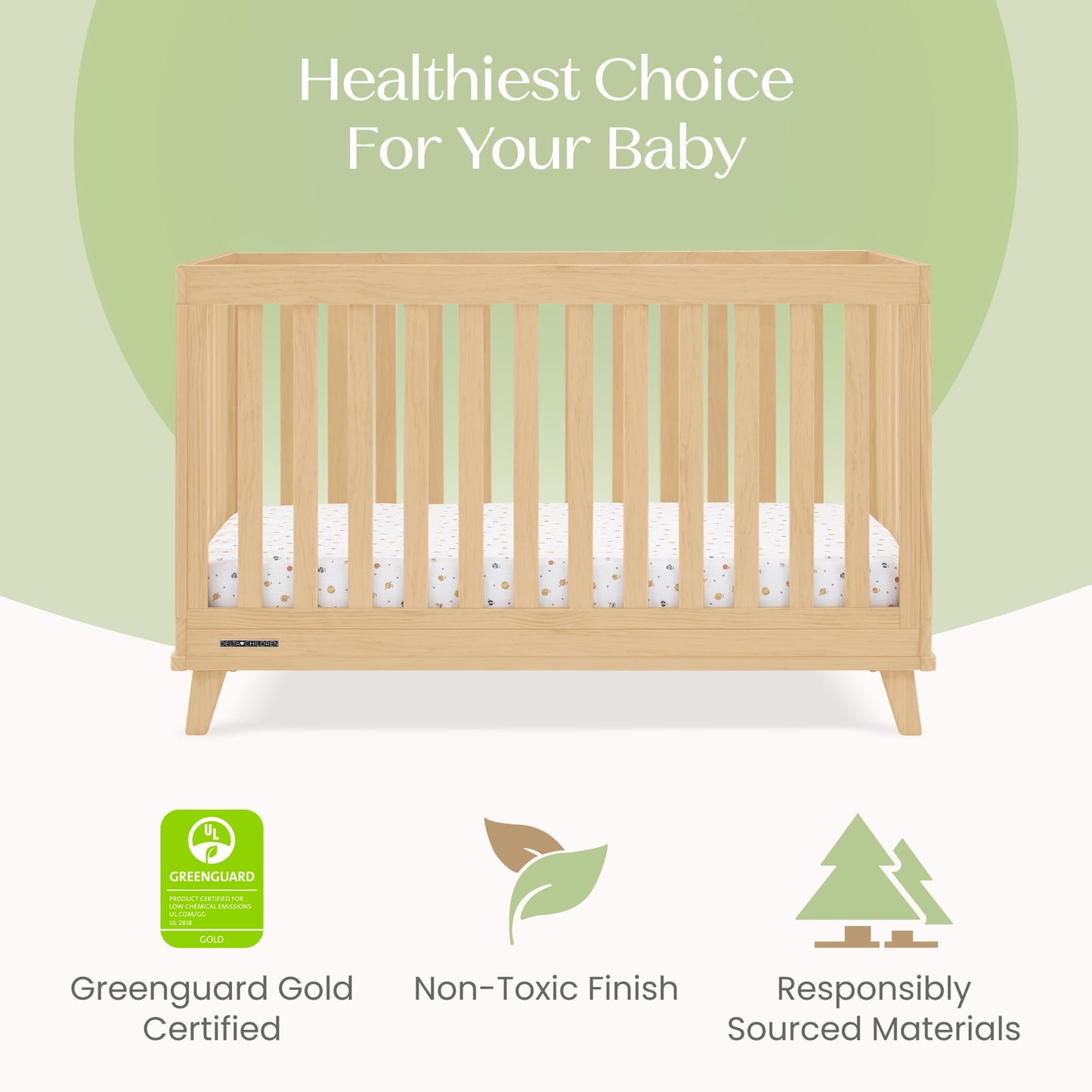 A light wood baby crib with a mattress, set against a green and white background with icons