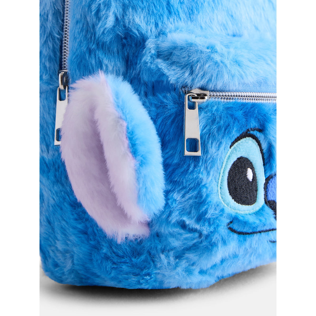 Cute mini backpack with soft fabric design and compact storage for everyday essentials